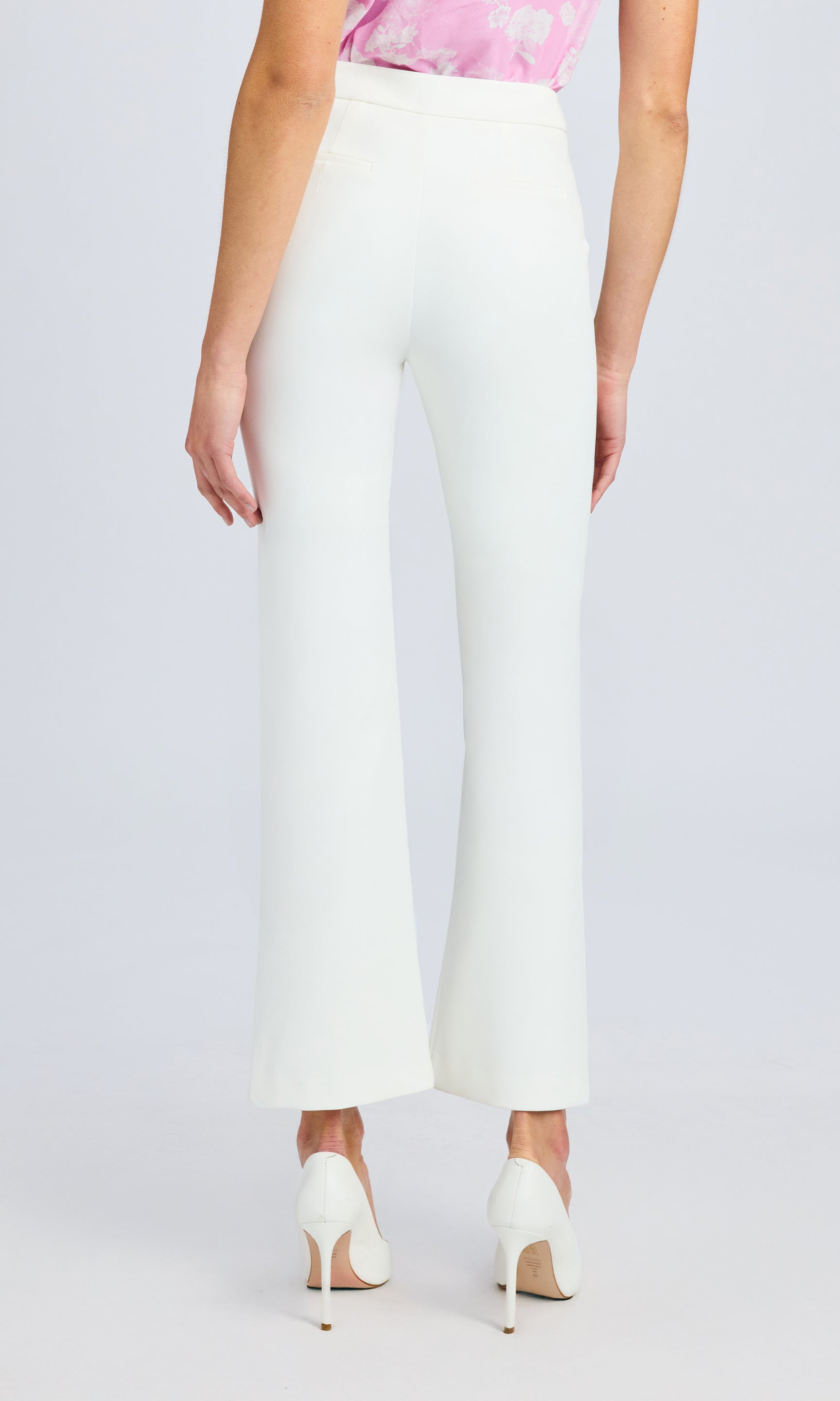 Back view of the white high-waisted pants.