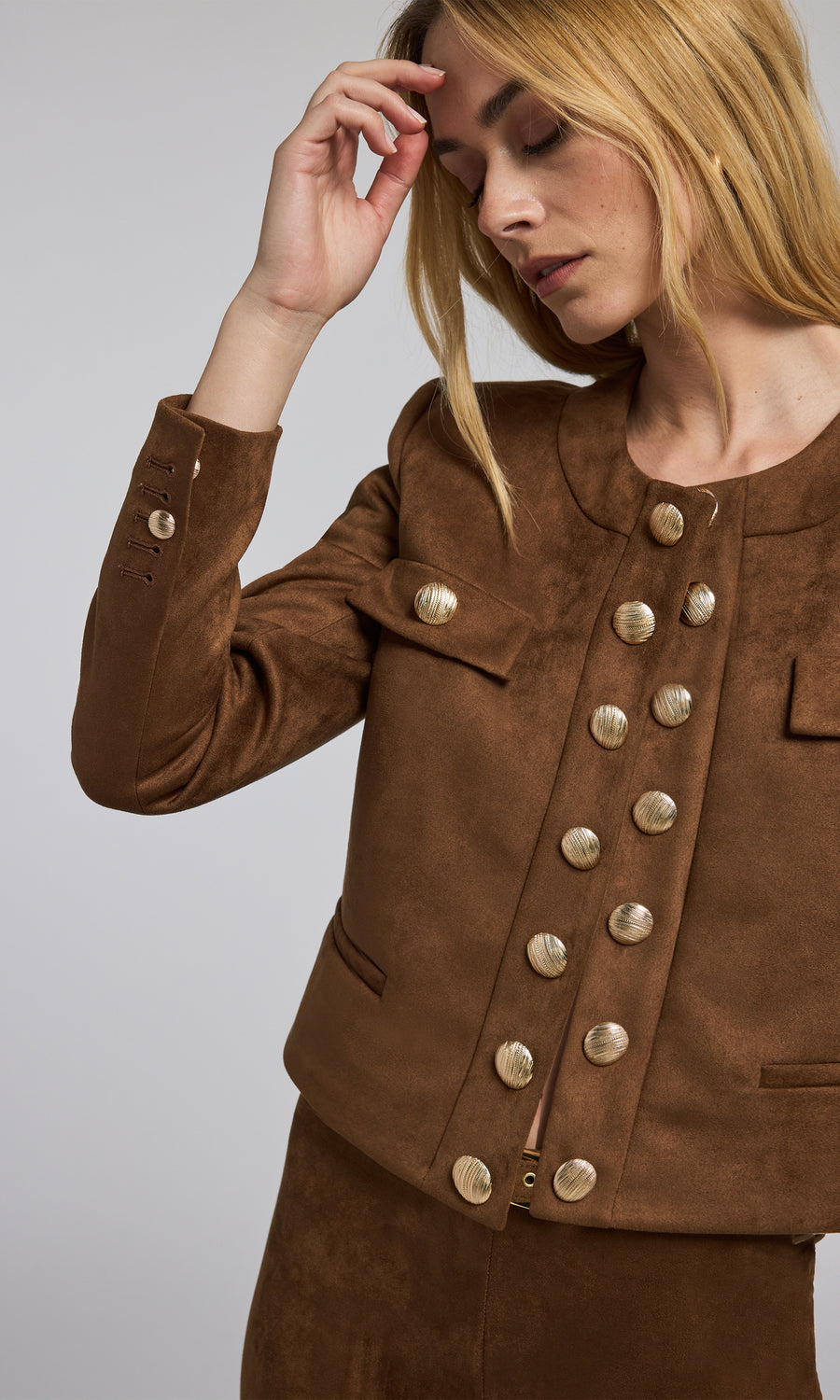 Stylish caramel jacket with buttons on the front, made from premium vegan suede, ideal for a sophisticated look.