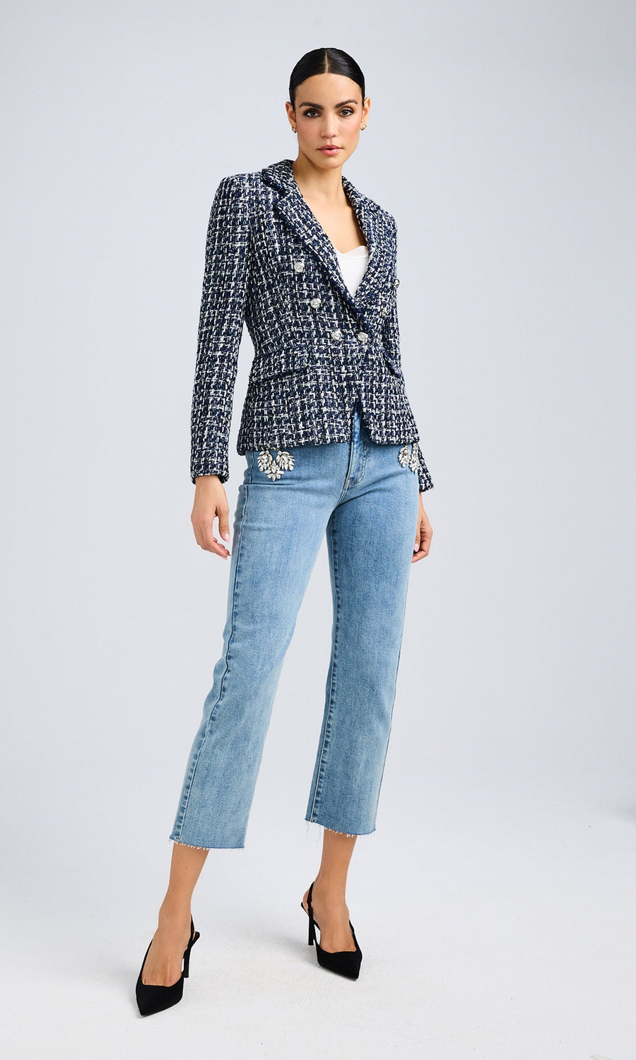 Full-body view showing the blazer paired with jeans and pointed heels