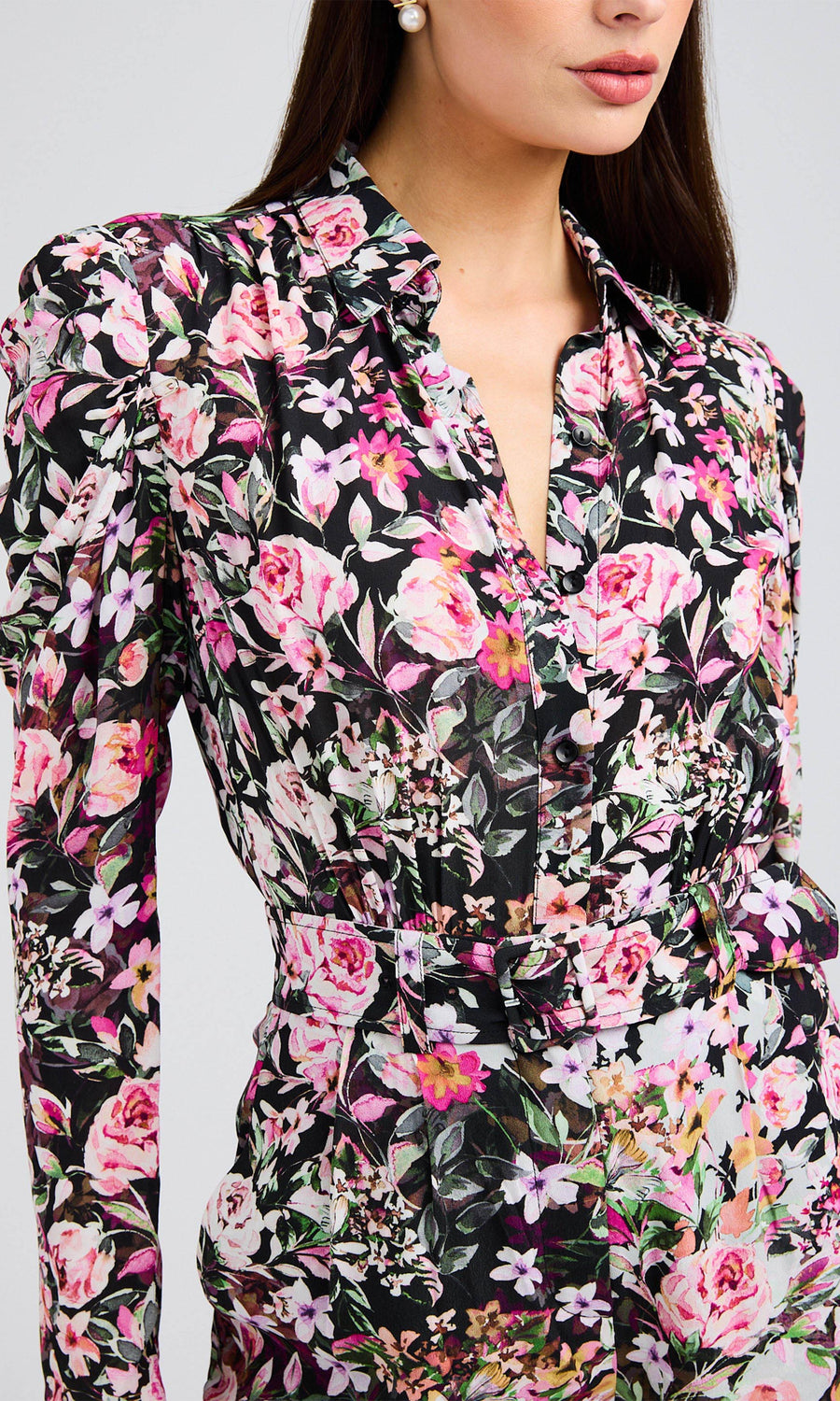 Close-up of the Kaline floral romper, highlighting the intricate floral pattern and structured neckline.