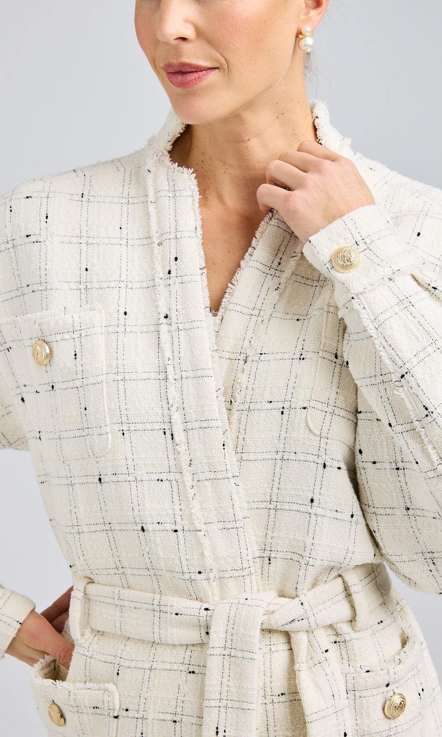 Close-up highlighting the intricate gold laurel wreath shield buttons and the soft, textured tweed fabric.