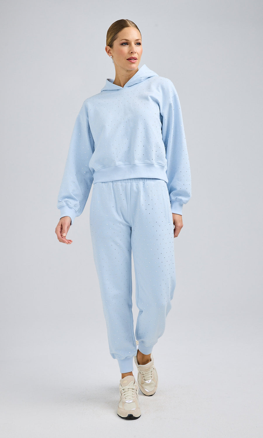 Soft cotton blue sweatshirt and sweatpants set, perfect for comfort and casual wear.