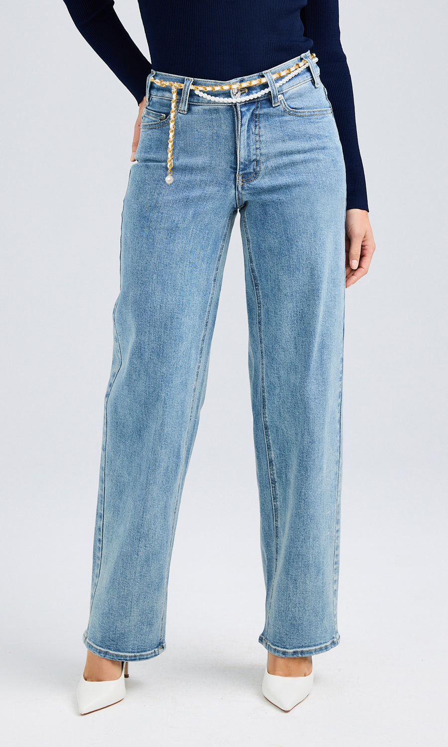 A pair of wide leg denim jeans featuring a stylish belt, showcasing a relaxed and trendy fit