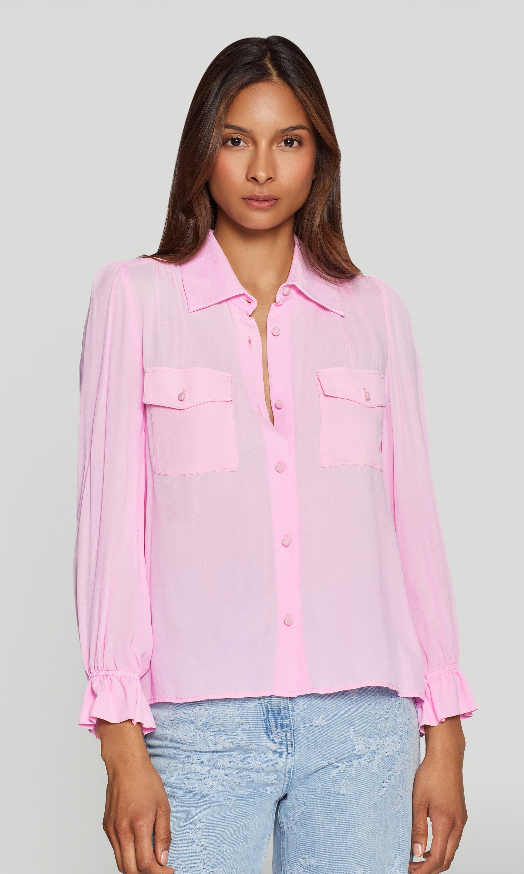 Model wears the Priya Georgette Shirt in soft rose in a front view, highlighting the flap chest pockets, relaxed fit, and slightly sheer finish.