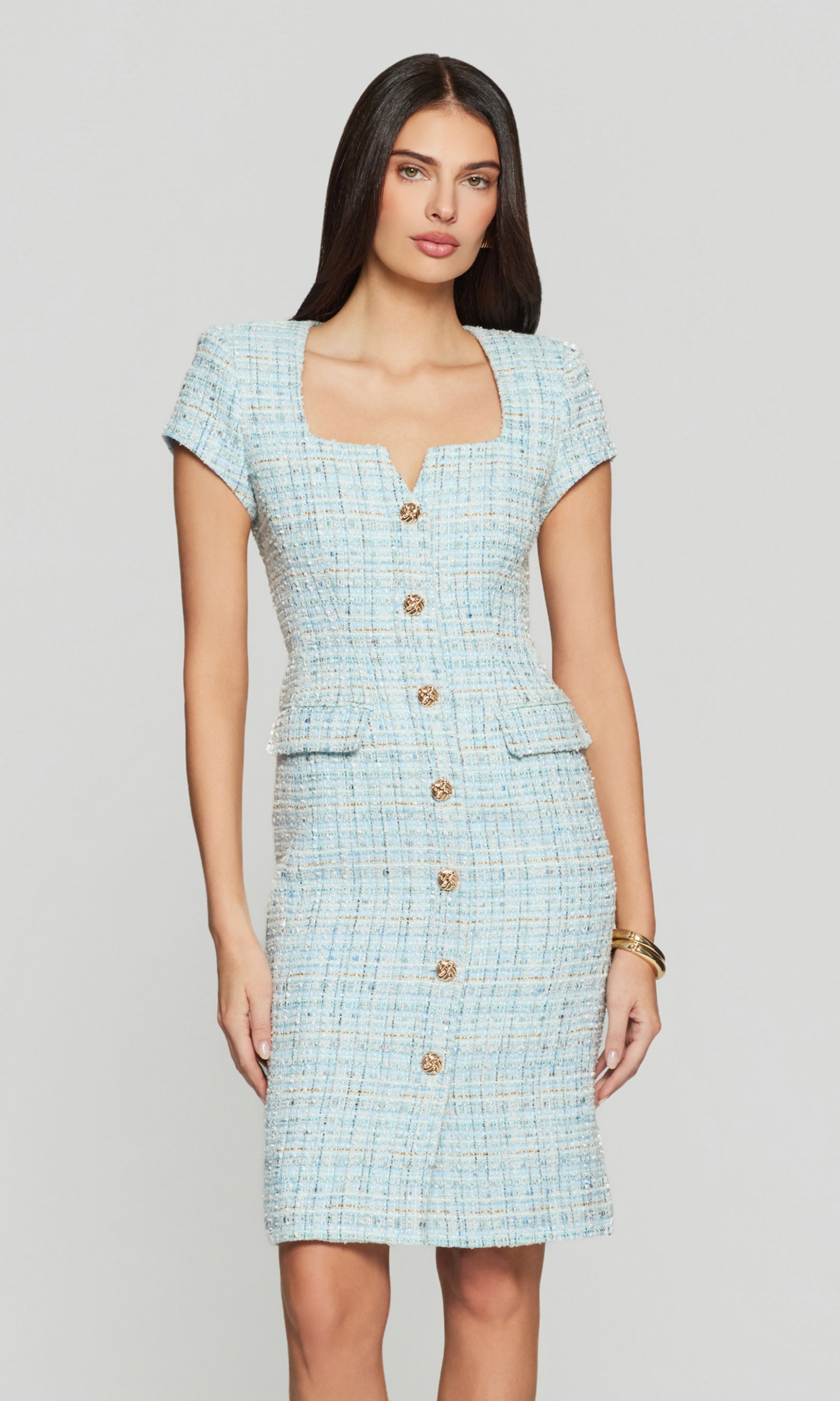 Model wears the Sierra Tweed Dress in aqua melange in a full-body front view on a clean background, showing the fitted shape and button-front detail.