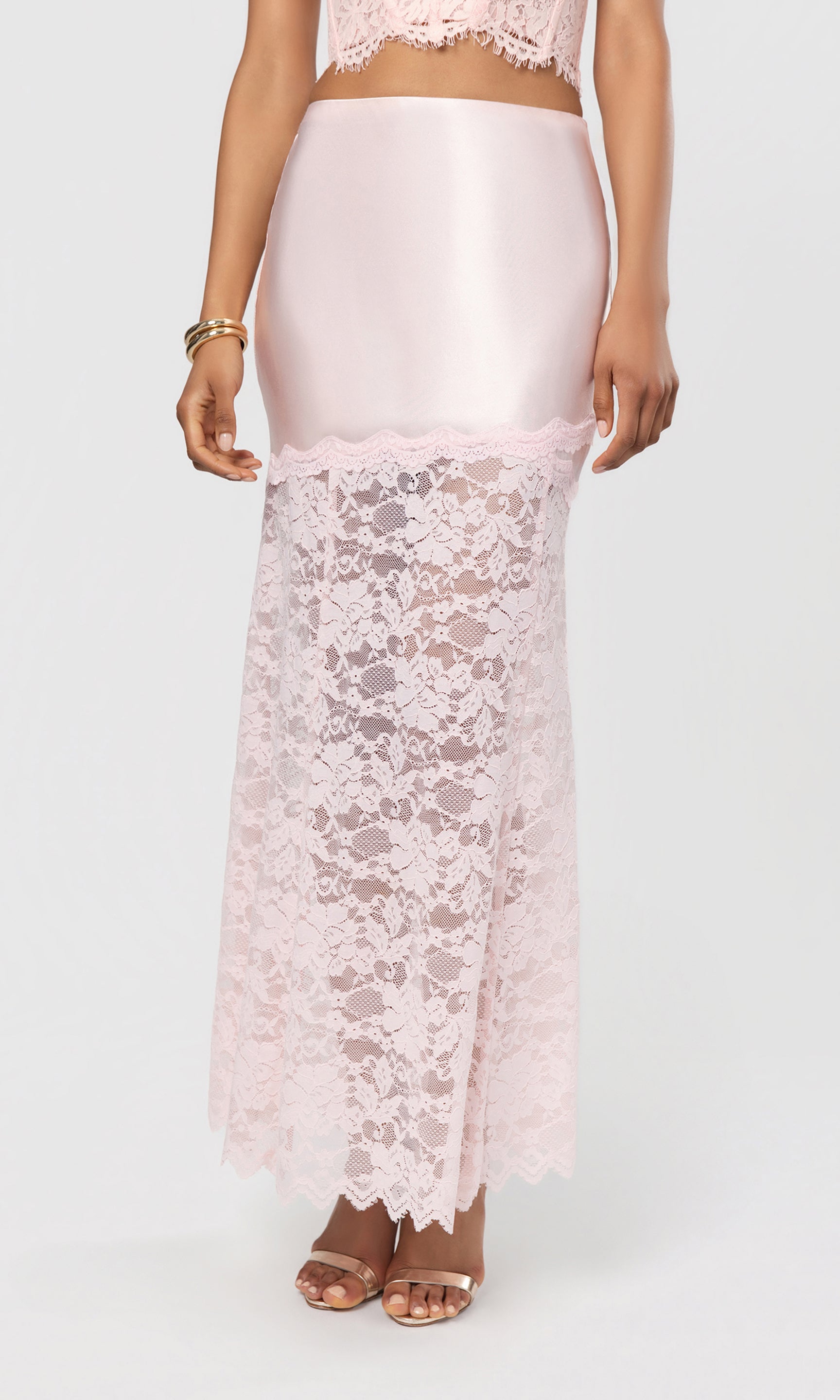 Pink lace skirt with a white background