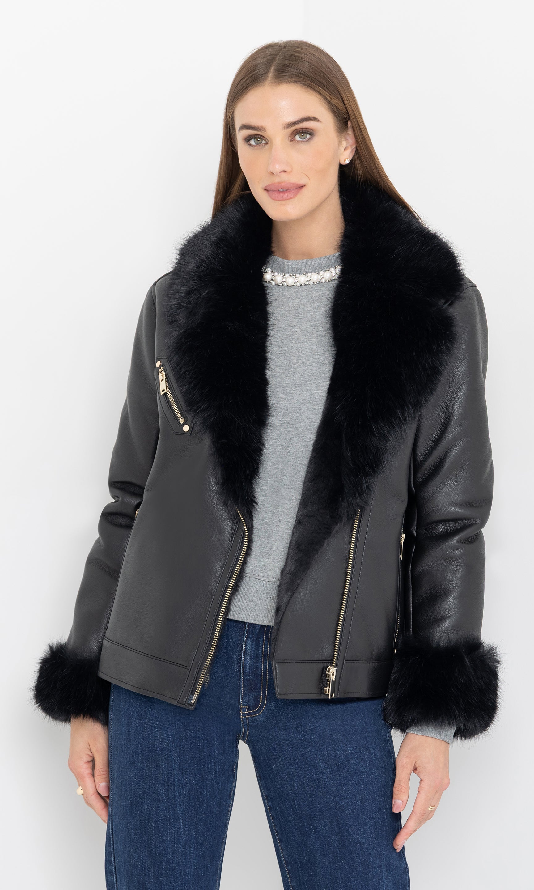 Angled front full body view of the moto jacket with wide faux shearling collar.