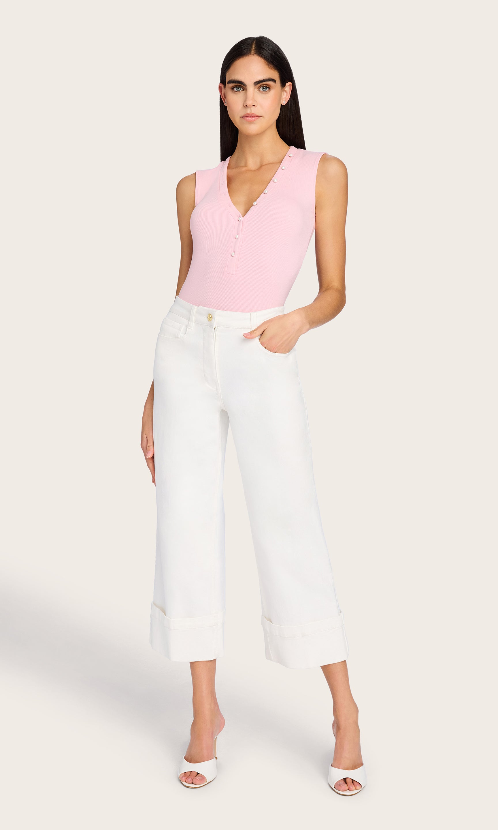 Full body image showing the Zoelle Rib Tank in a casual-chic look, paired with white culottes and neutral heels.