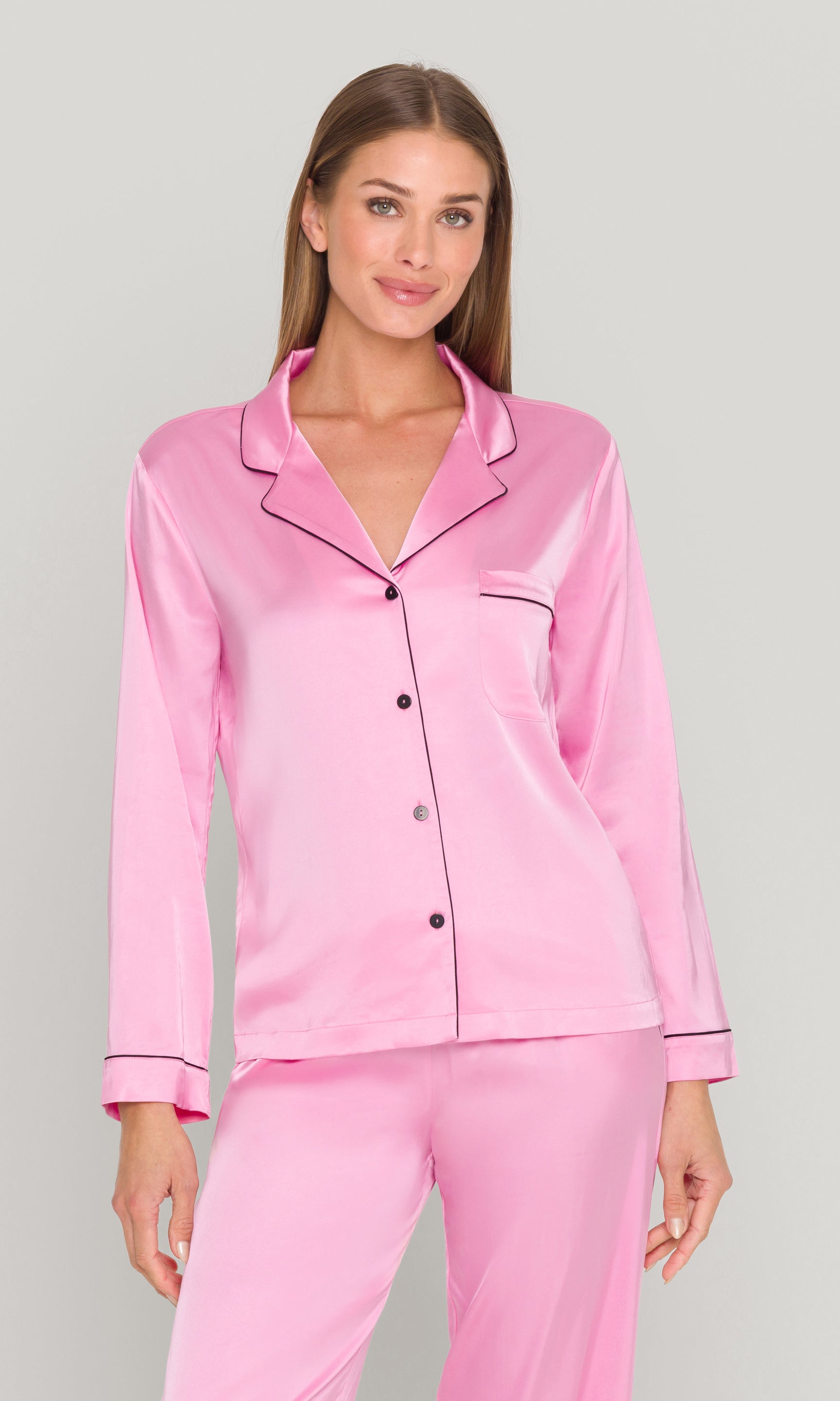 Woman in pink pajama set