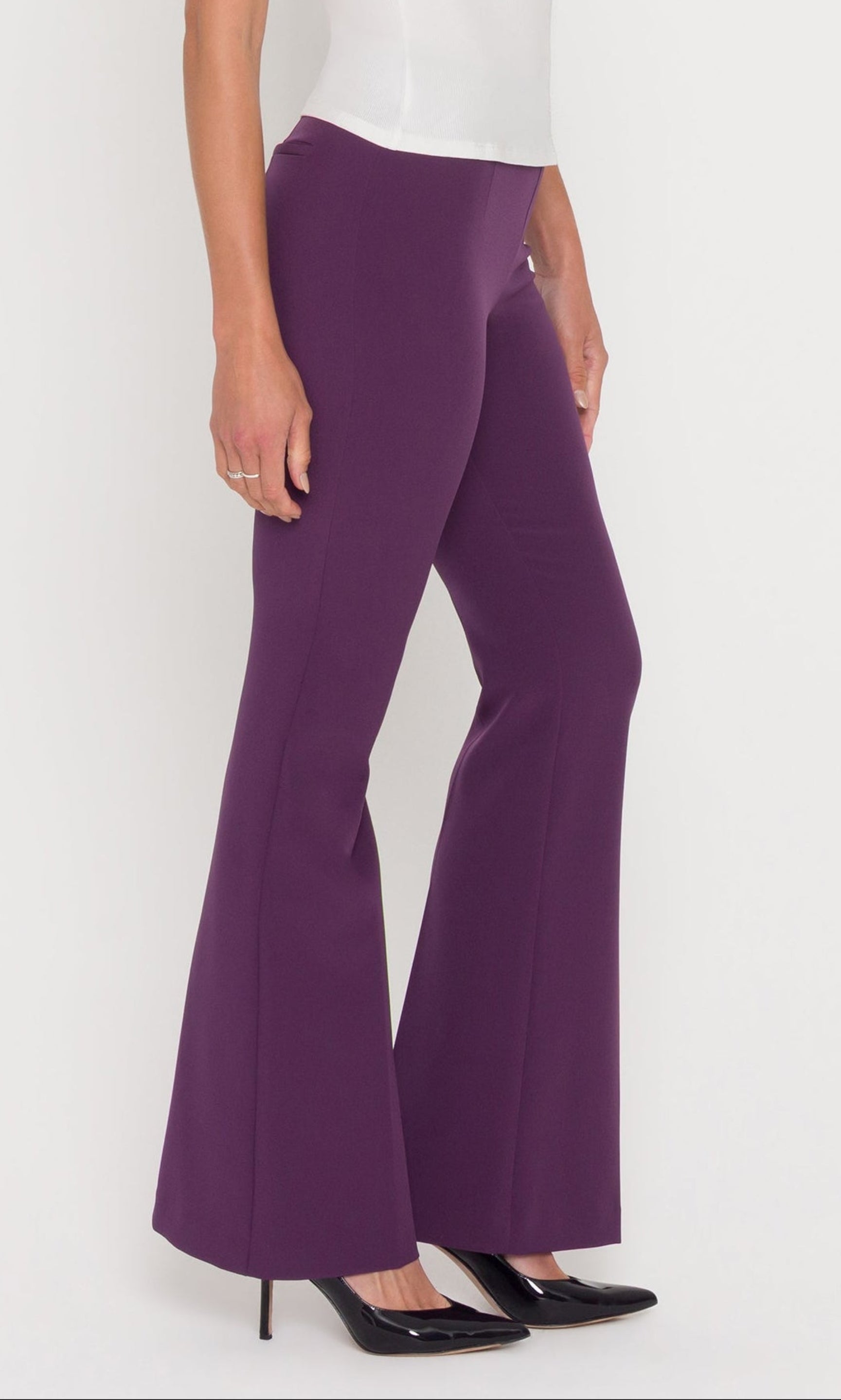Side view of eggplant high rise pants with subtle flare