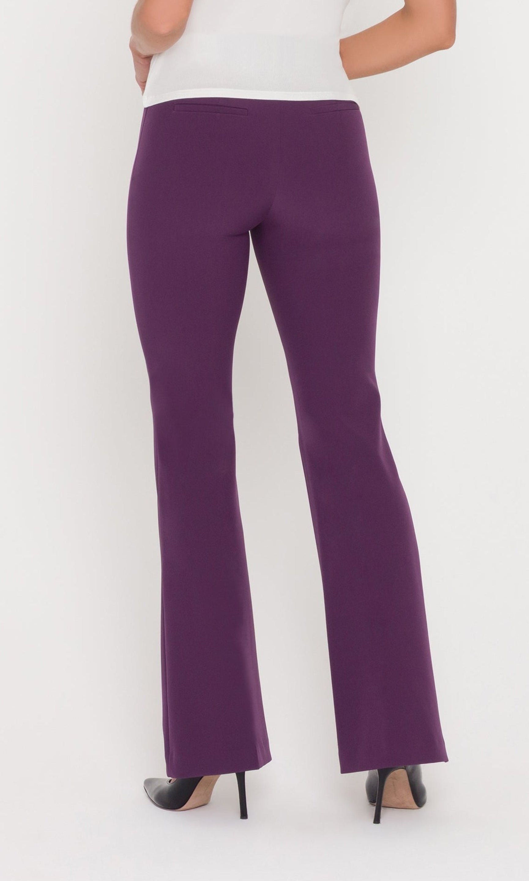 Back view of eggplant high rise pants with subtle flare